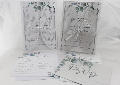 Design examples - precision cut gate fold with tie ribbon, personalised with Bride and Groom's initials in design